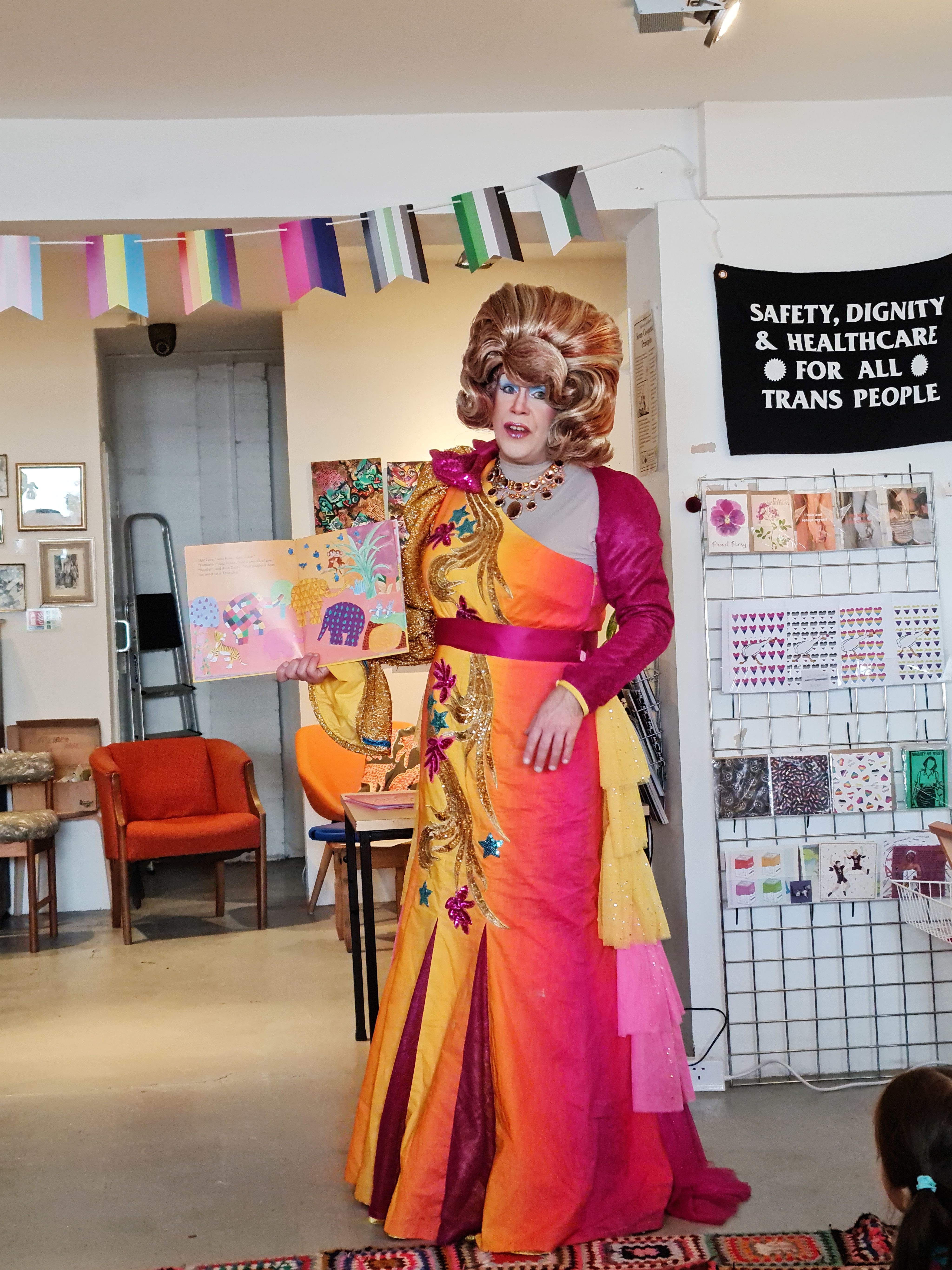 Mama G reading to children at Storytime with Mama G at The Queery, Brighton
